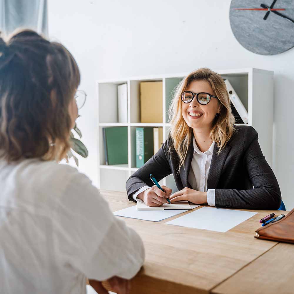 Image of an interview with a business owner and a potential employee