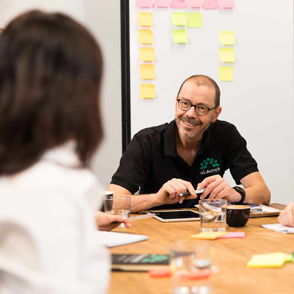 A uLaunch consultant talks with a job seeker