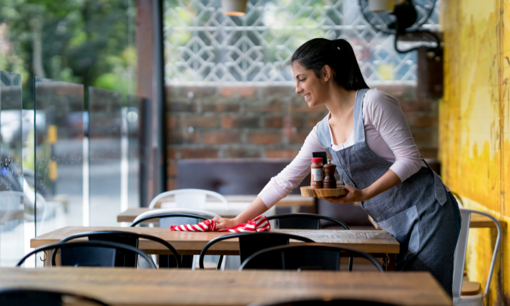 Stock image to represent uLaunch participant working in a local cafe